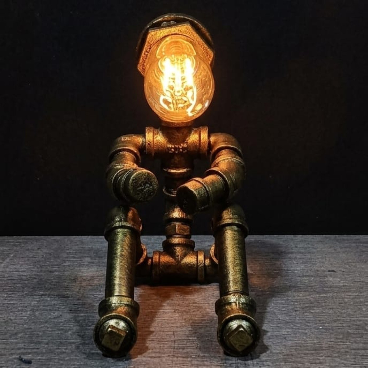 Seated Industrial Figure